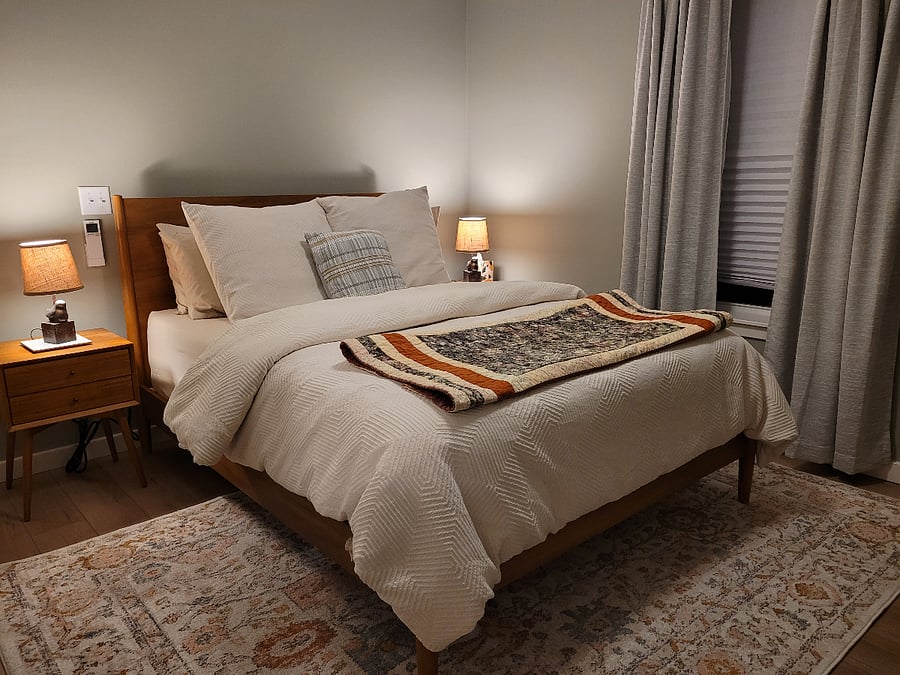 Second-floor bedroom with a queen bed