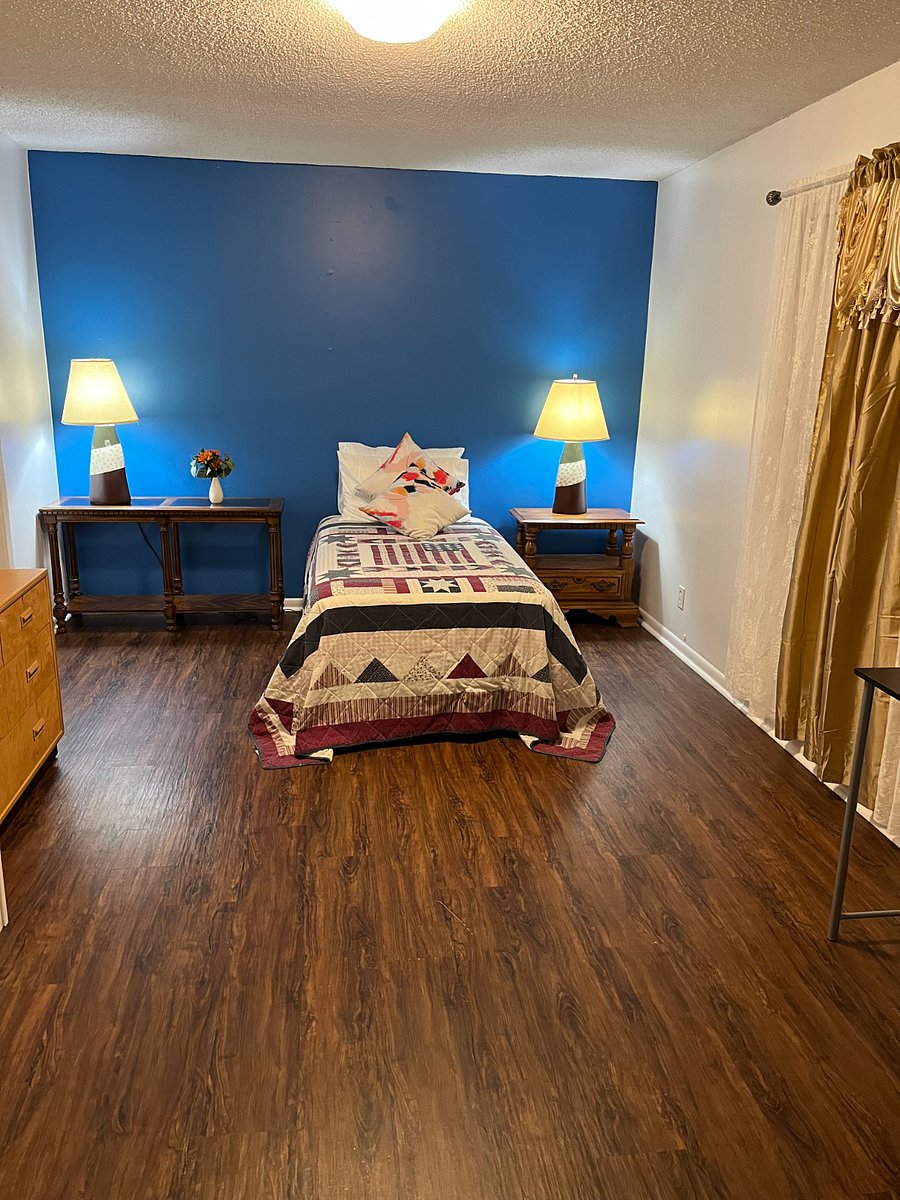 "Blue" Bedroom  the largest of the three bedrooms, offering ample space and a comfortable retreat for your stay.