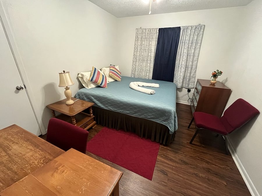 King-size bed in the middle bedroom  spacious, comfortable, and perfect for a restful nights sleep.
