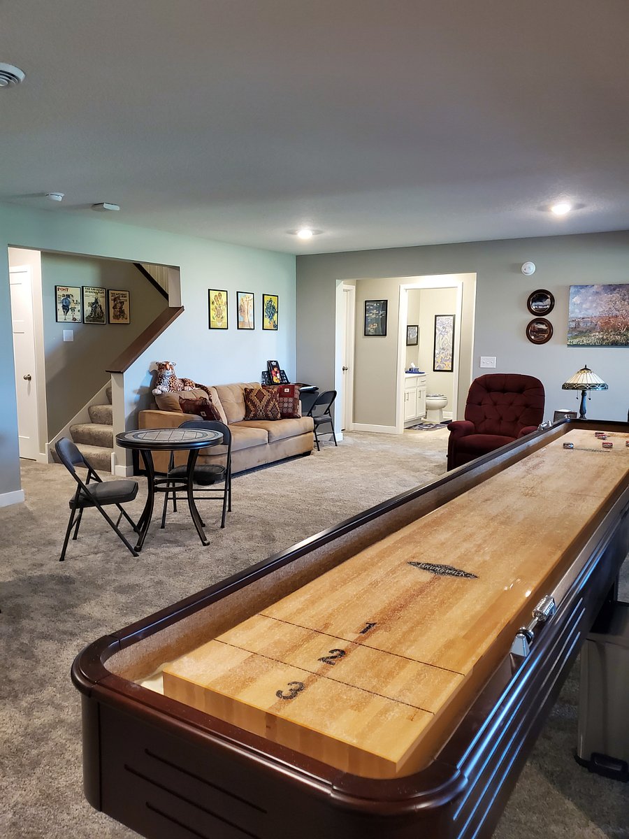 Double pullout couch and shuffleboard outside your room