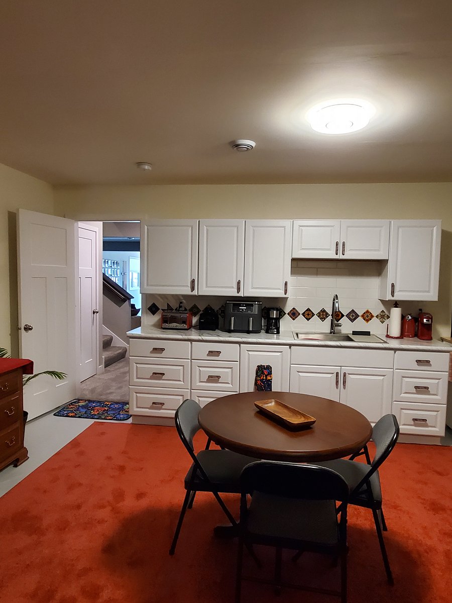 Kitchenette fully furnished with cookwares and dishes