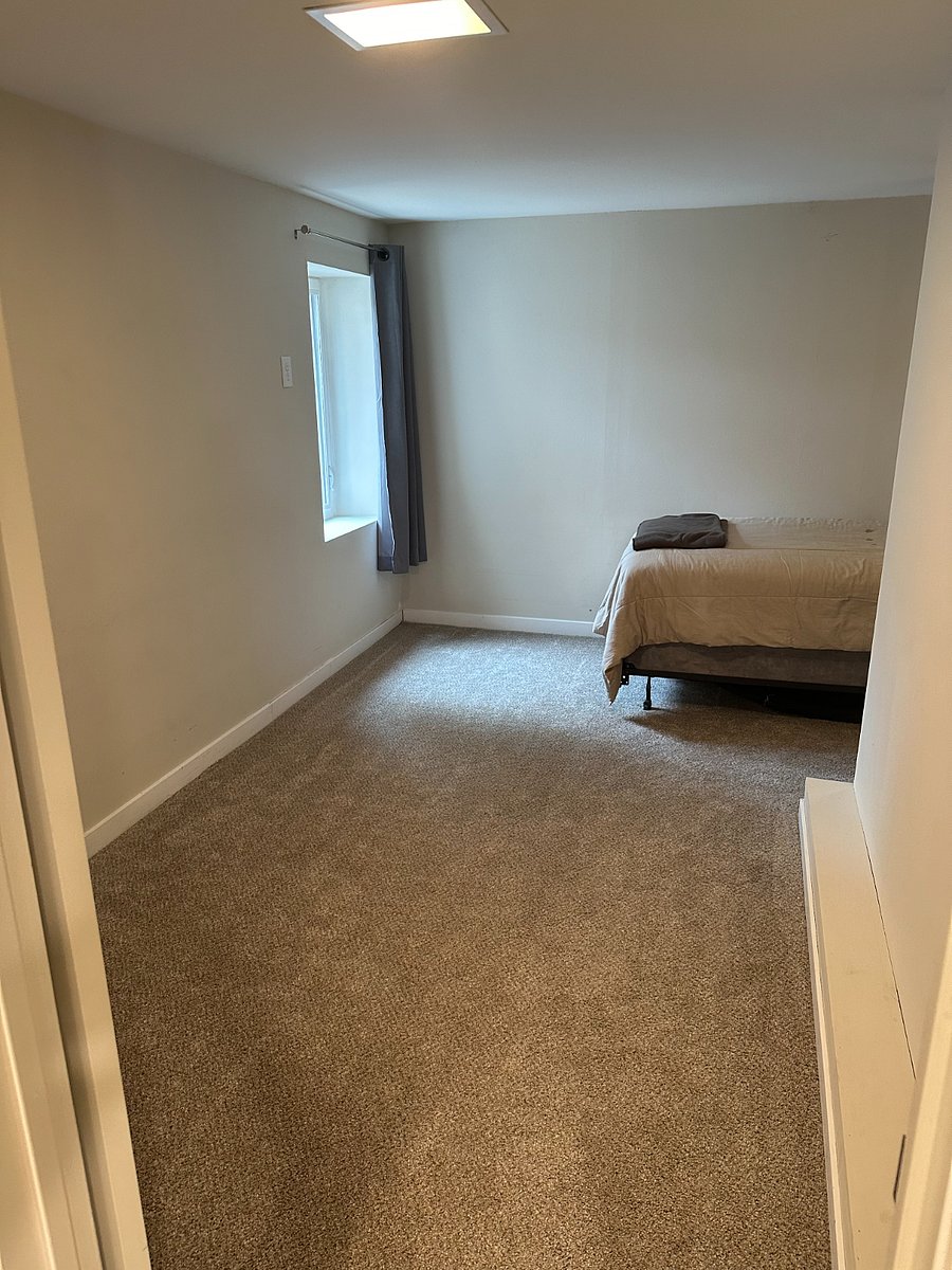 The smaller bedroom has a twin bed in it currently, but it can be used as an office or as storage