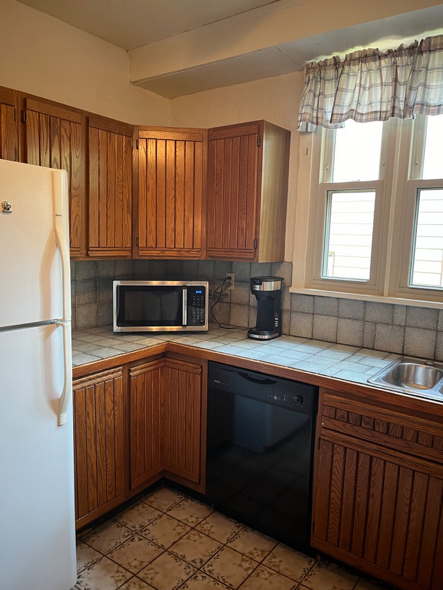 New microwave. Dishwasher and Keurig single cup coffee maker.