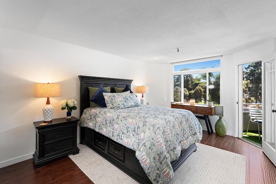 Spacious bedroom overlooking the park with black-out shades and luxurious queen-sized bed. Plenty of storage!