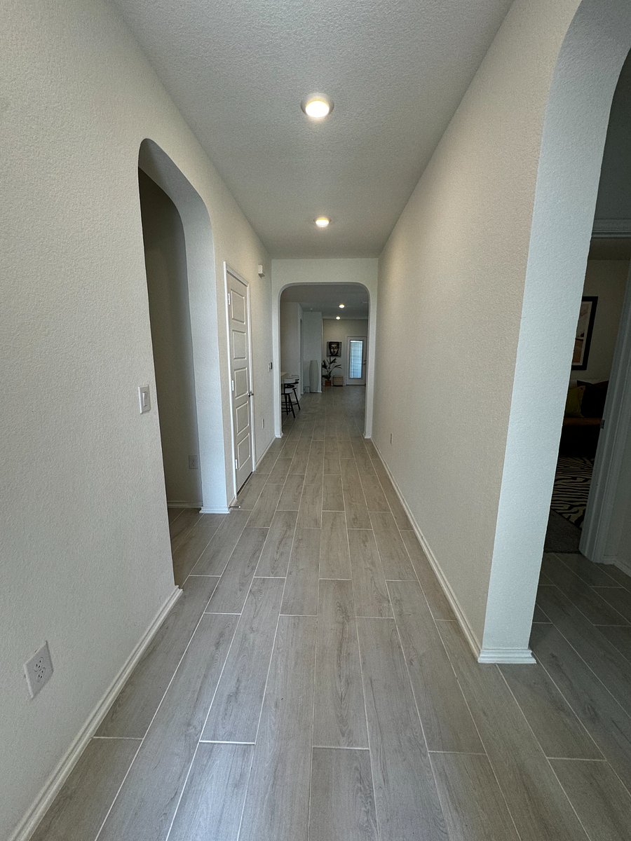 view when you enter the home, two bedrooms and Full bath to the right, 3rd bedroom and laundry to the left. Split design giving you full privacy in your Masterbed and bath area.