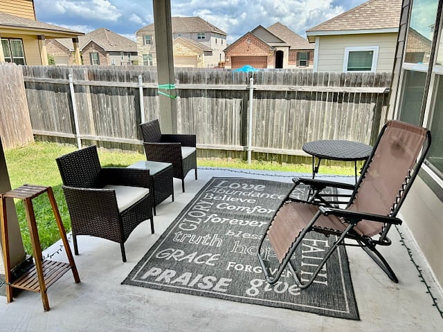 large outdoor patio for entertaining, and fenced in back yard - keeping kids safe!
