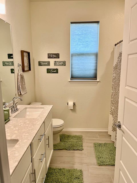 2nd Full bath, The Sage Room, has double sinks, shower/tub combo