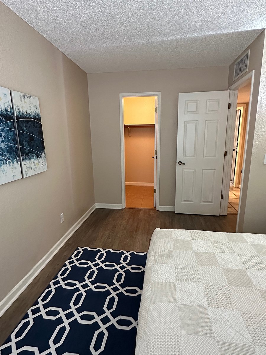 Second bedroom showing walk in closet