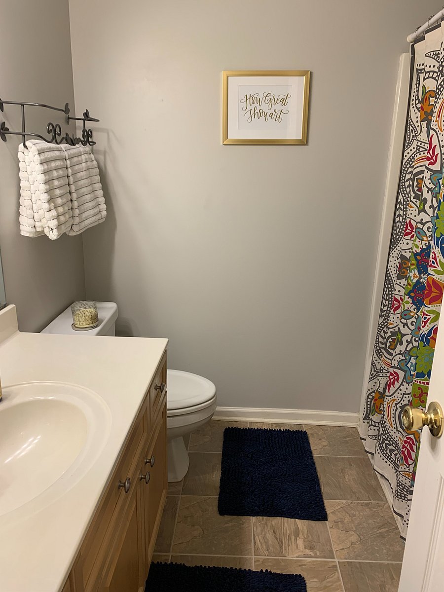 Guest Private Bathroom just steps down the hall. Curved shower rod for added room in the shower. Also, new shower head.