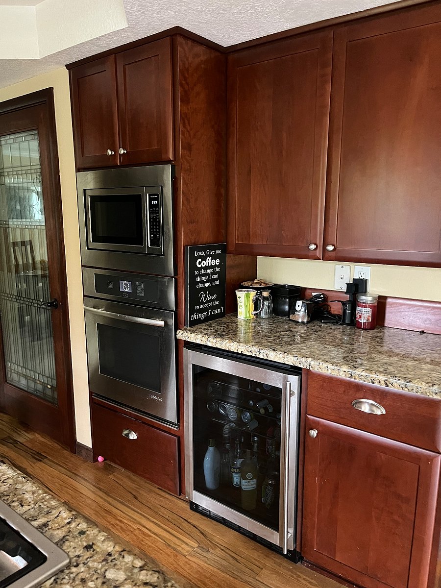 Microwave, convection oven, and warming drawer. The warming drawer can double as a slow cooker. It also is a great place to proof bread. 