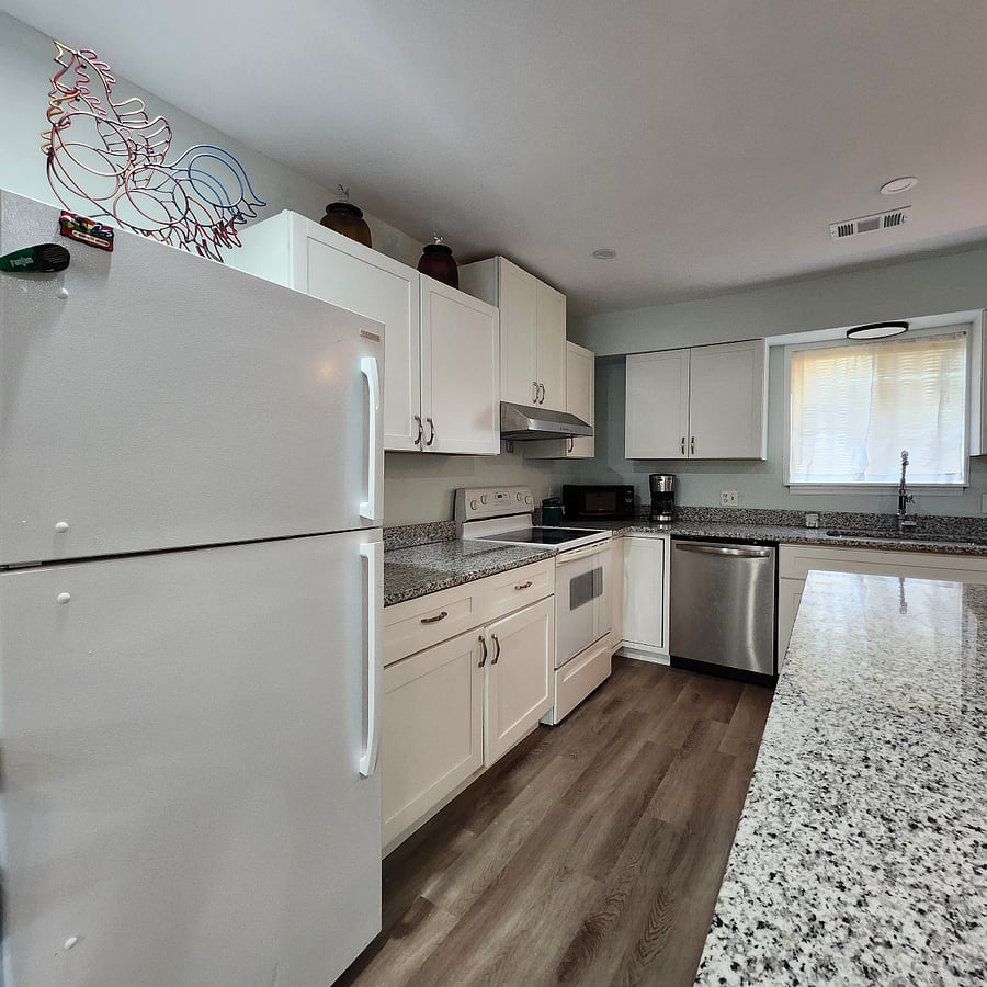 Kitchen is stocked for all your cooking, dining & drinking needs