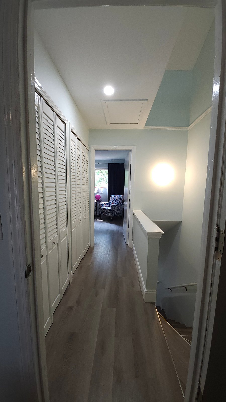 Upstairs hallway has extra closet space.