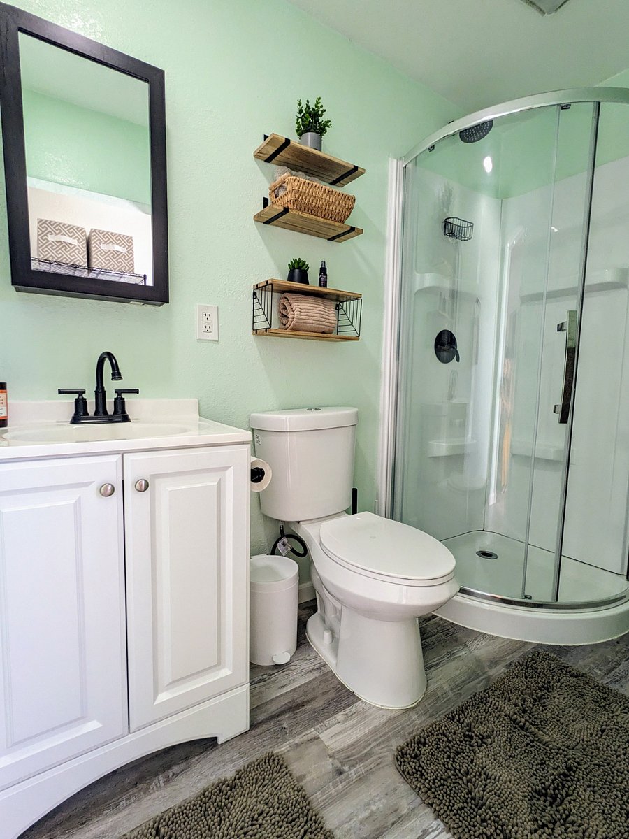 Modern bathroom with extra storage behind the mirror
