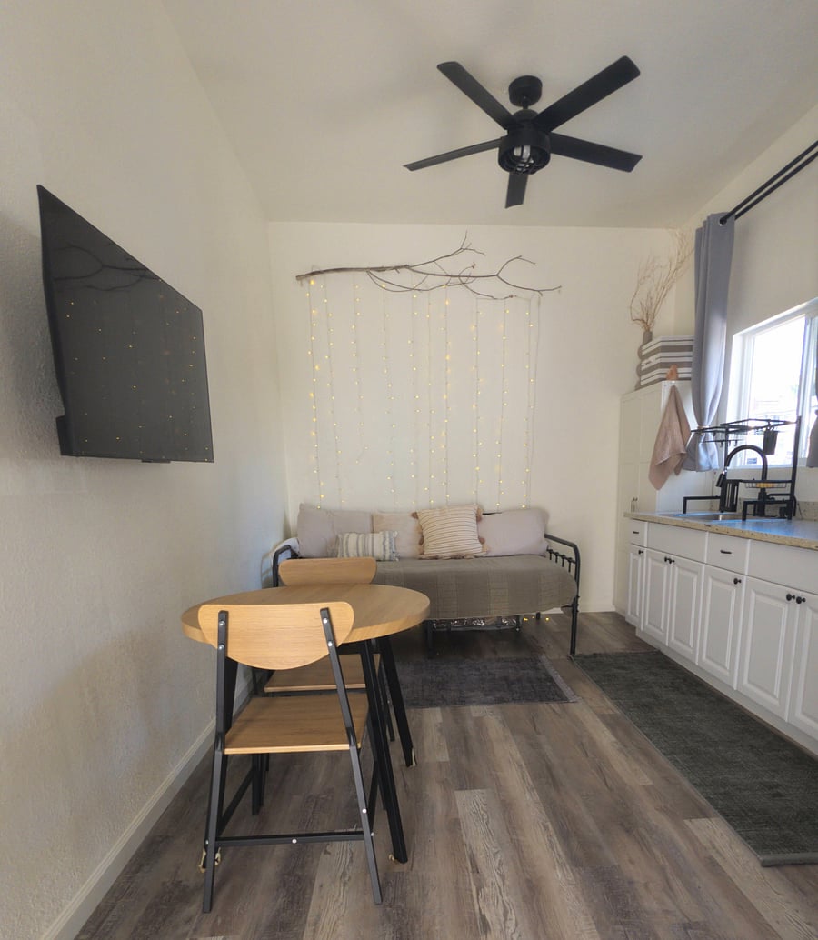 43" smart TV on swing arm swivel mount so you can enjoy your favorite shows from the dining area or bed