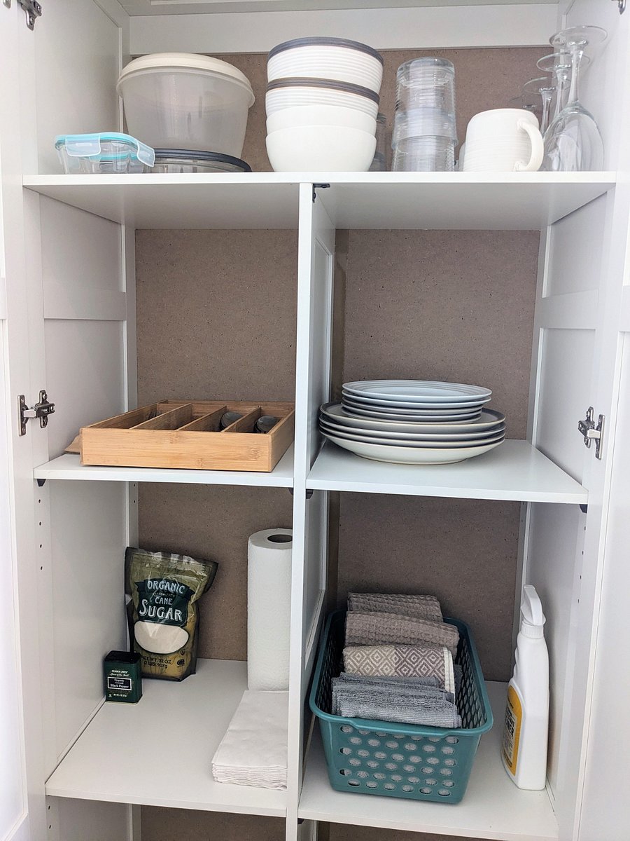 The pantry is stocked with daily essentials and there's plenty of room for your goods.