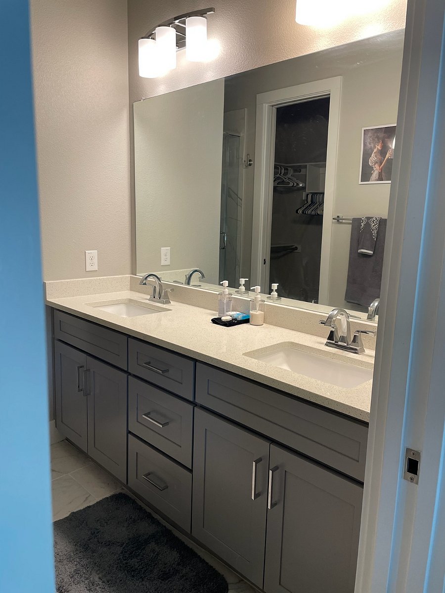 Bedroom C-Private attached en suite bathroom with glass shower and double vanity