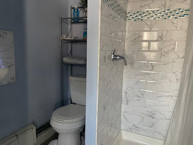 Comfortable bathroom space with linens and nite-light