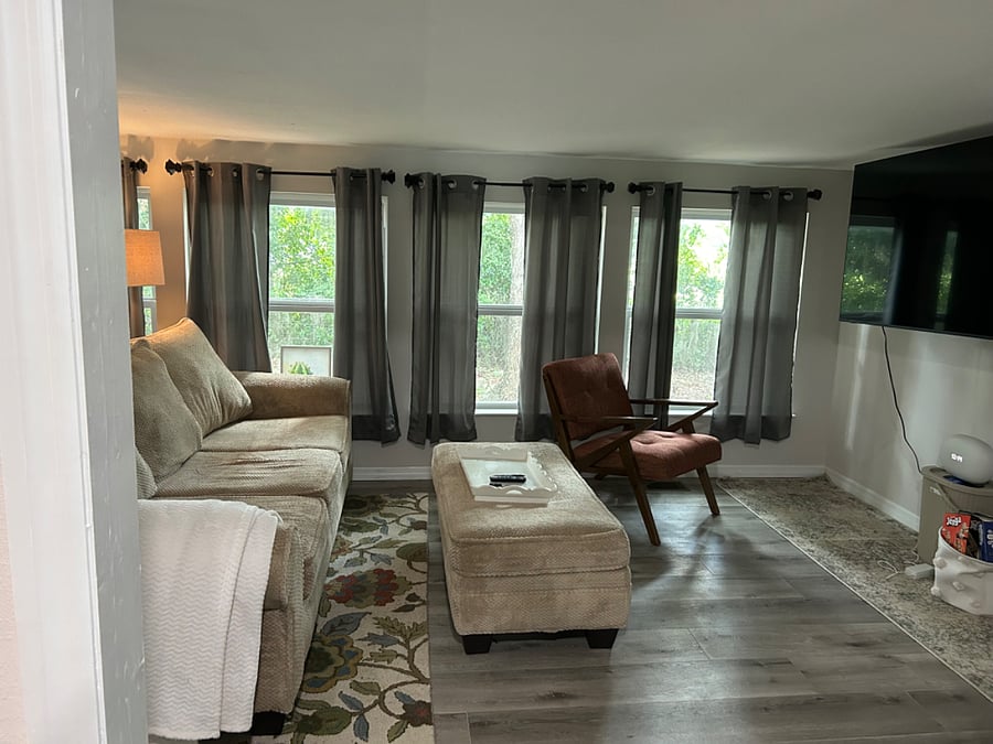 Family room with 52 inch Smart TV.