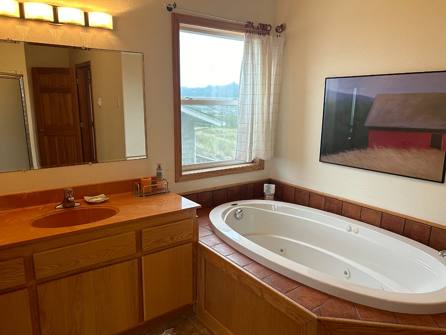 Bathroom attached to primary bedroom