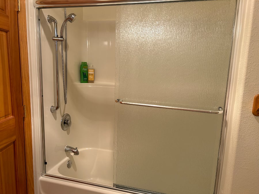 Downstairs shower over tub