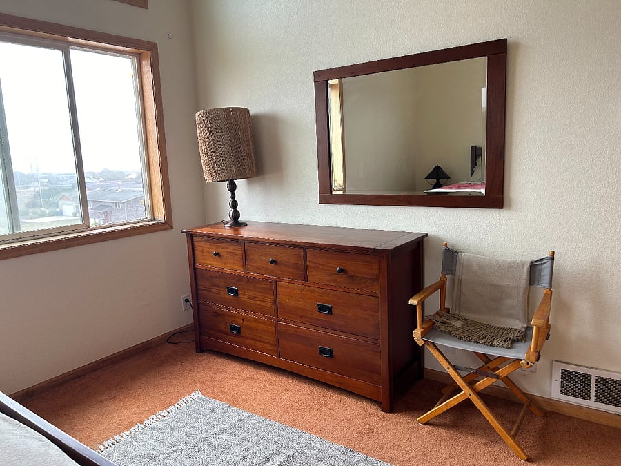 Second bedroom with view east toward Alsea river and bridge