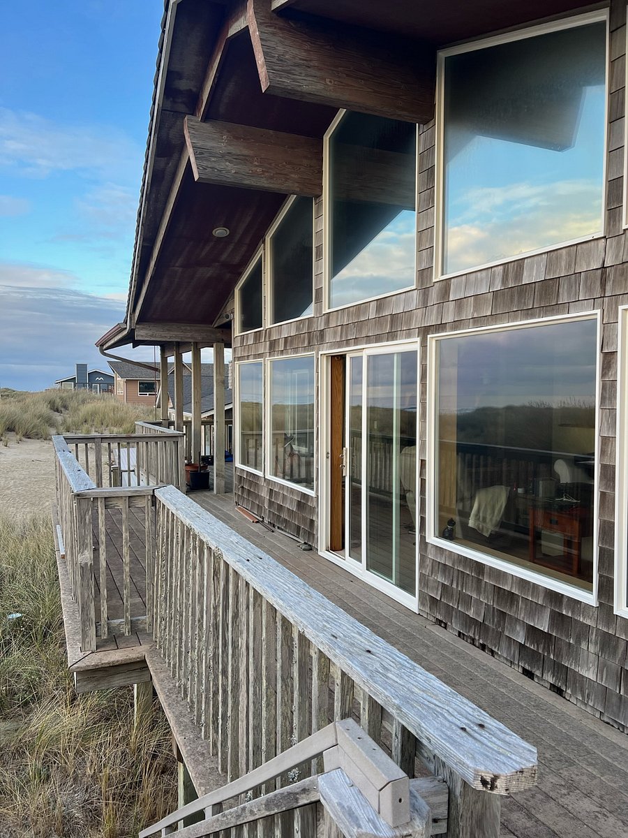 One balcony wraps around living area and primary bedroom
