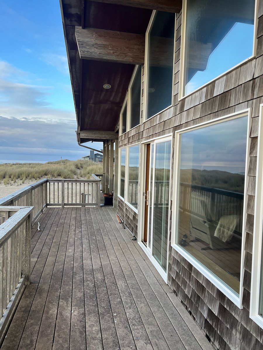 Wide balcony connected to living room with sliding doors