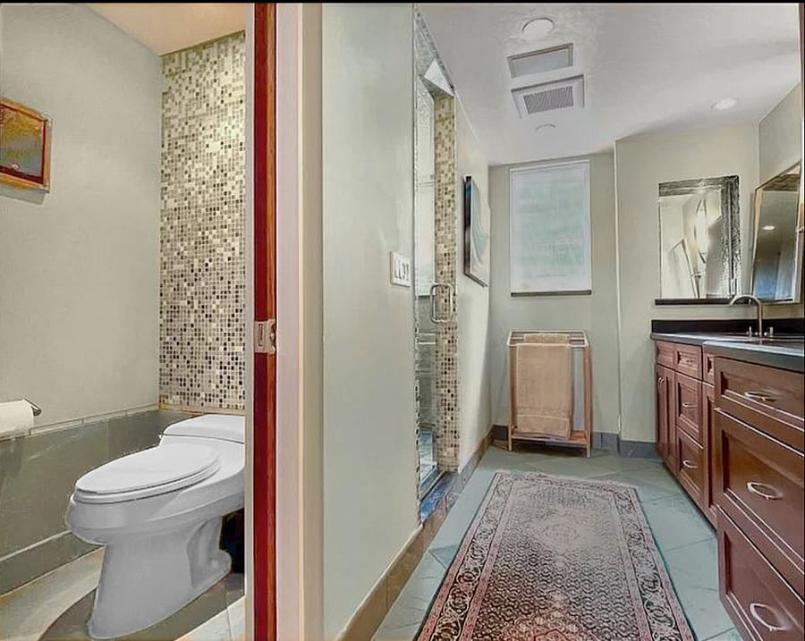 Bathroom/Dressing room with enclosed w/c.
