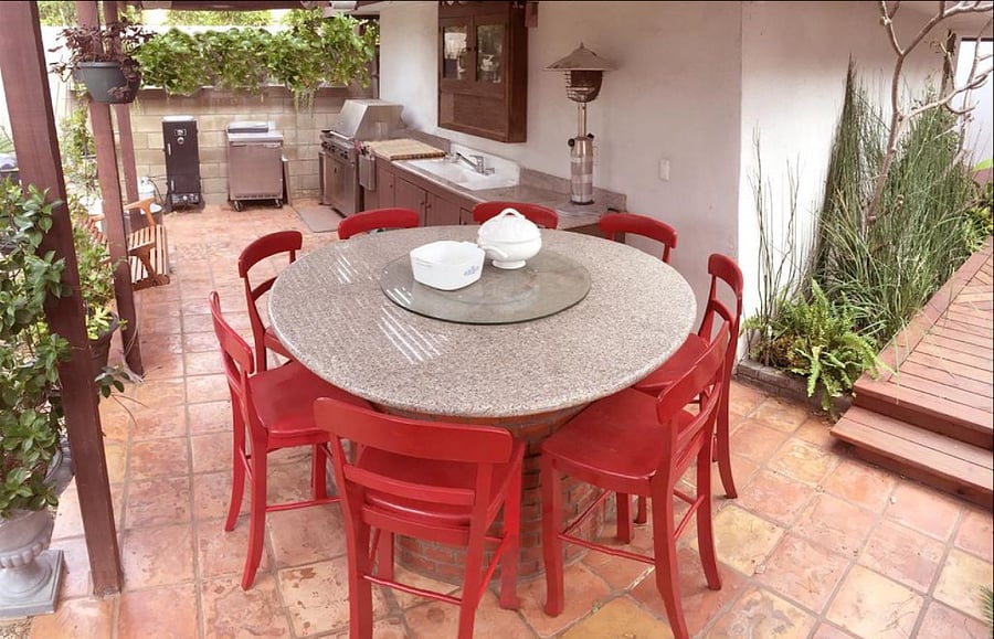 Outdoor kitchen and dining table for 8.