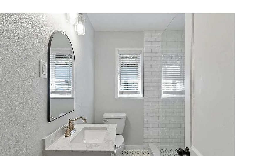 Updated clean bathroom with walk in shower