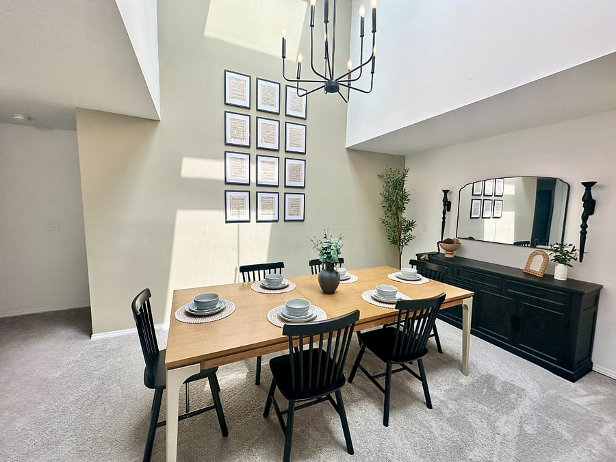 Beautifully lit dining room with tall ceilings, thanks to brand new skylights!