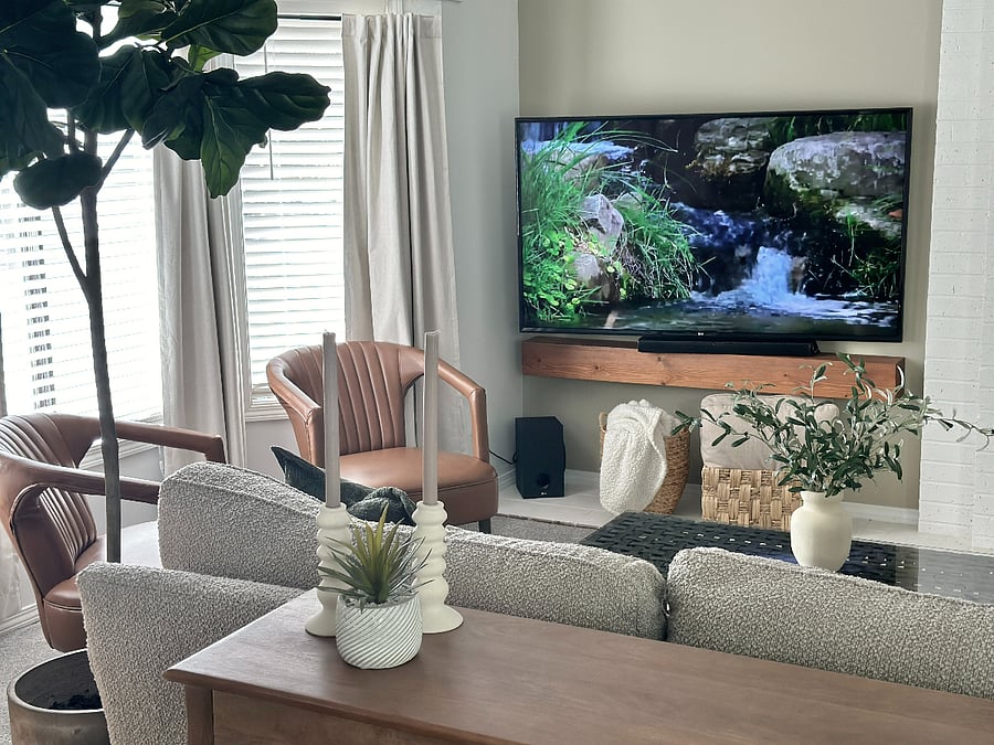 Cozy living room with a fireplace and 60 smart TVCozy living room with a fireplace and 60 smart TV