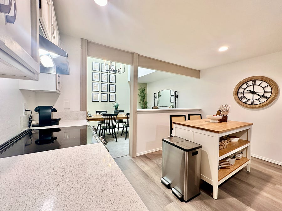 Fully equipped kitchen with all you need to get cooking! Brand-new stainless-steel appliances and a handy kitchen island with stools.