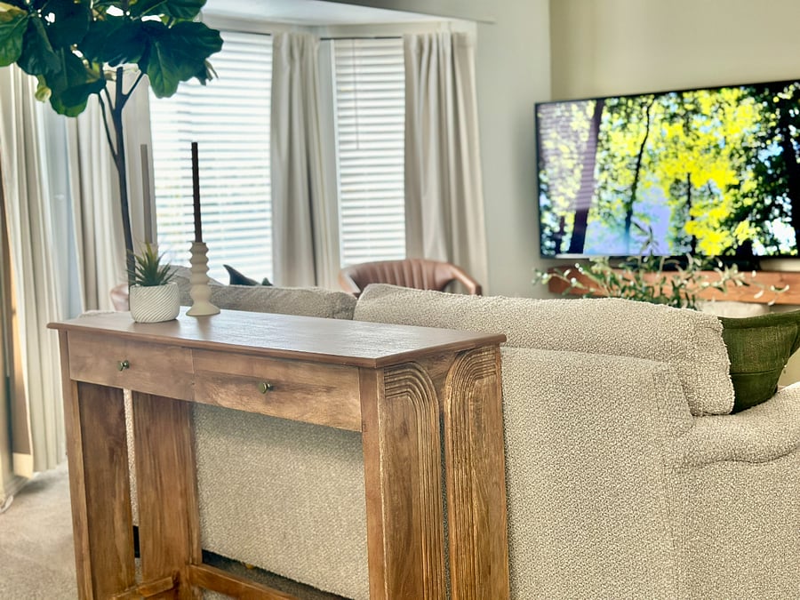 Cozy living room with a fireplace and 60 smart TV