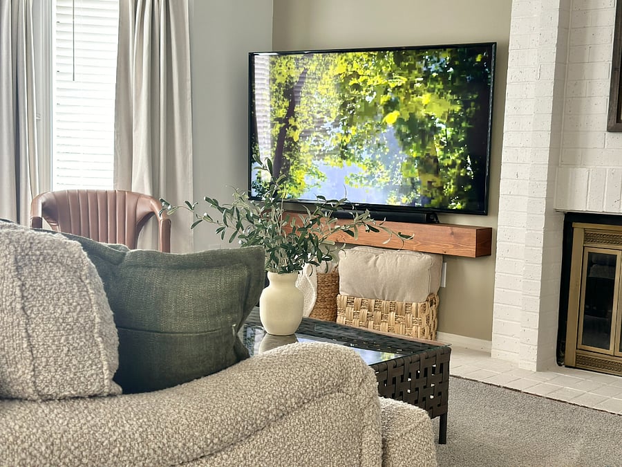 Cozy living room with a fireplace and 60 smart TV