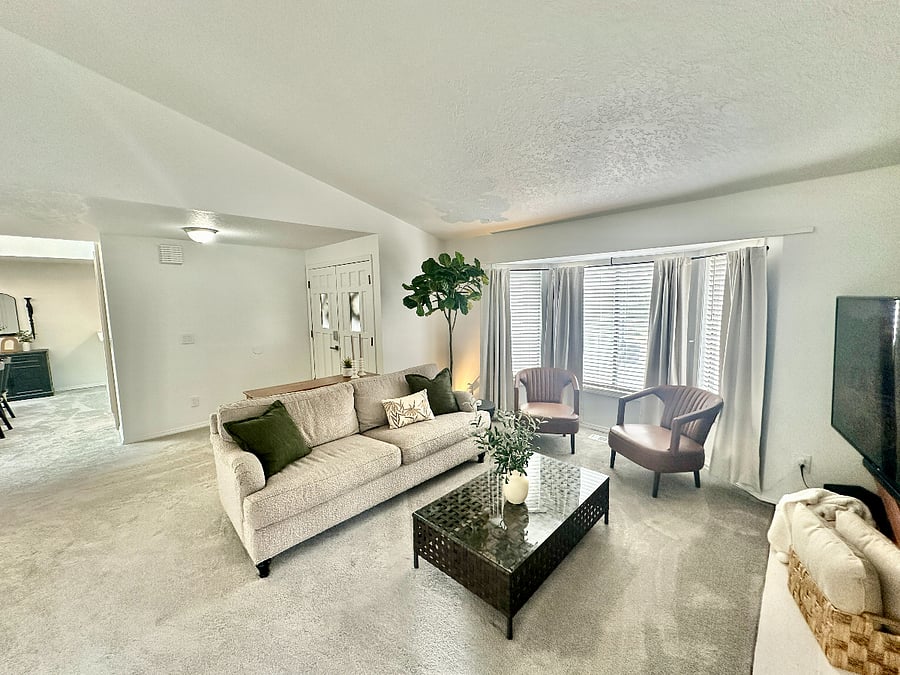 Cozy living room with a fireplace and 60 smart TV
