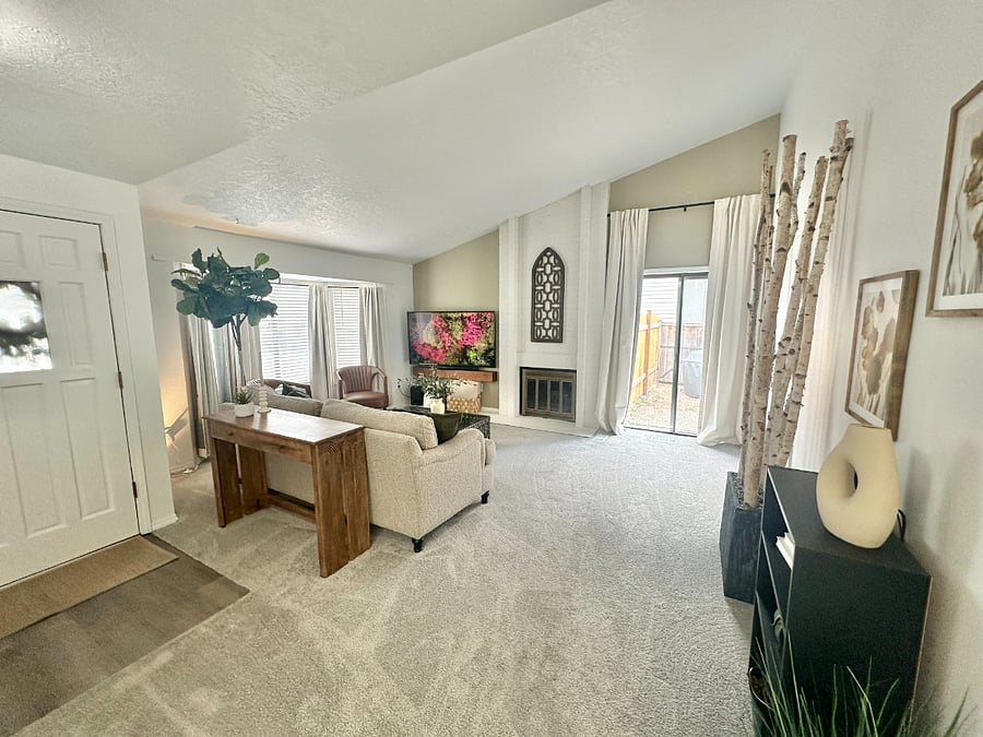 Cozy living room with a fireplace and 60 smart TV