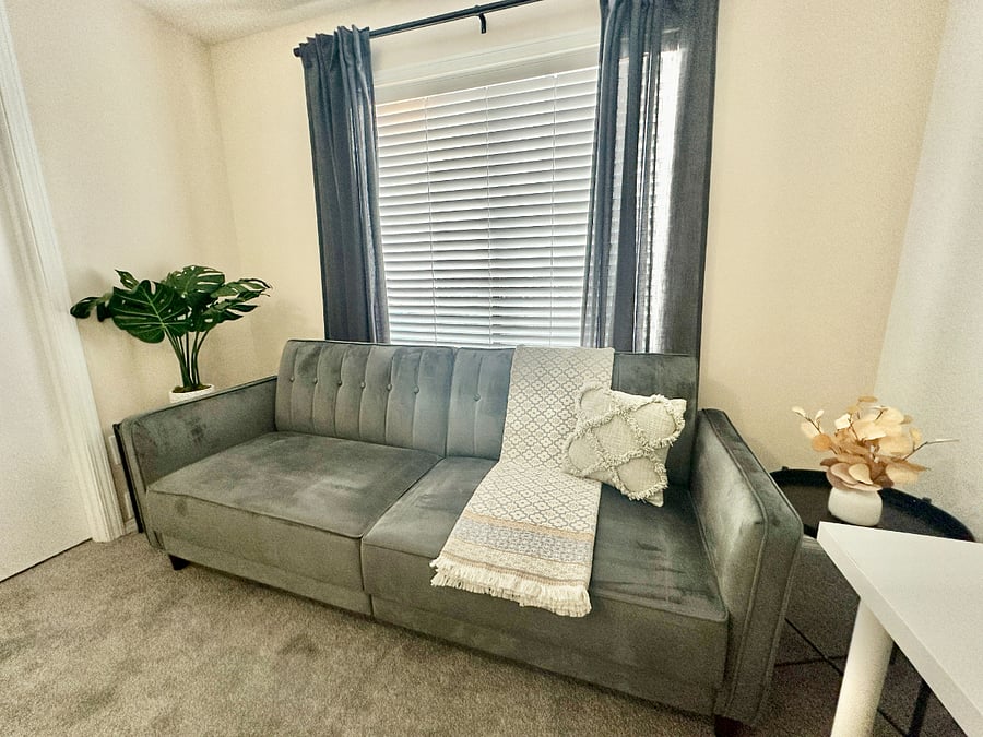 Futon couch that can be converted to full size bed.