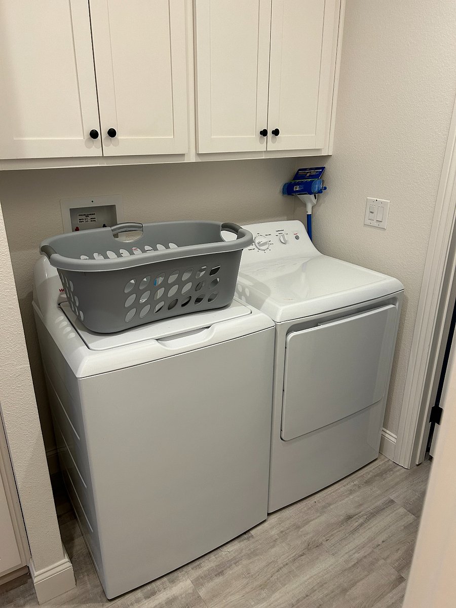 inside full-size washer and dryer.
