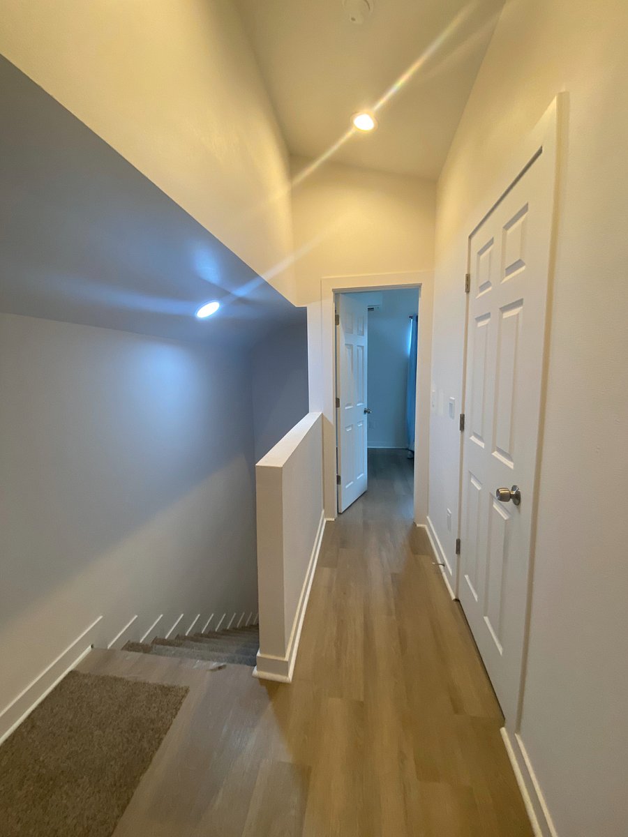Upstairs Hallway - View from BR #1 towards guest room. Bathroom in between