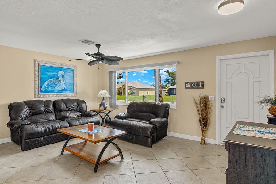 Front family room with reclining leather couches