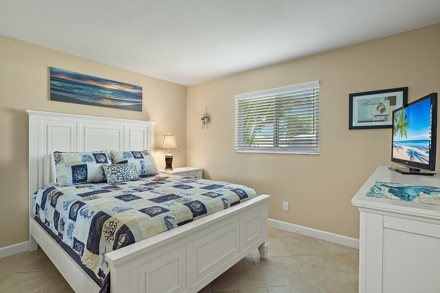 Queen bedroom with TV