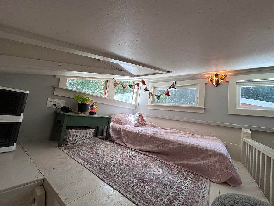 Loft over bedroom can be 2 twins or a queen. back