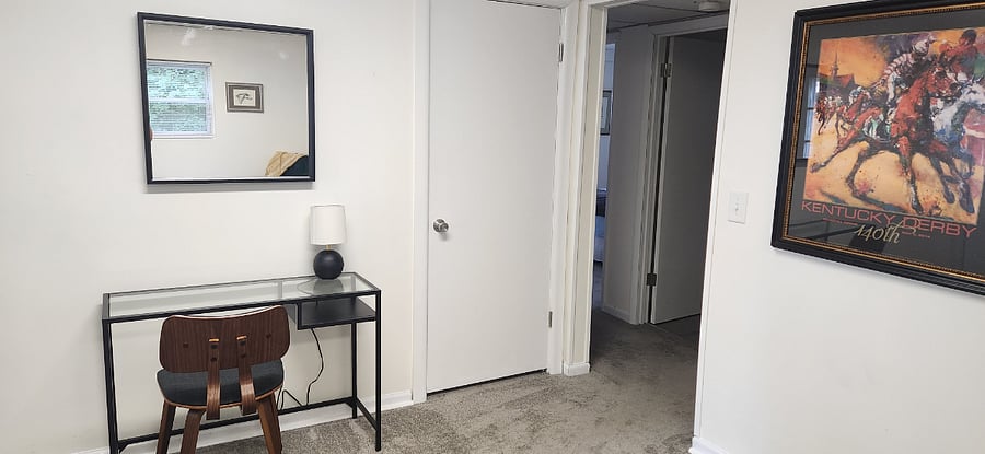 Dedicated workspace and cozy lounge area ideal for remote work or study.