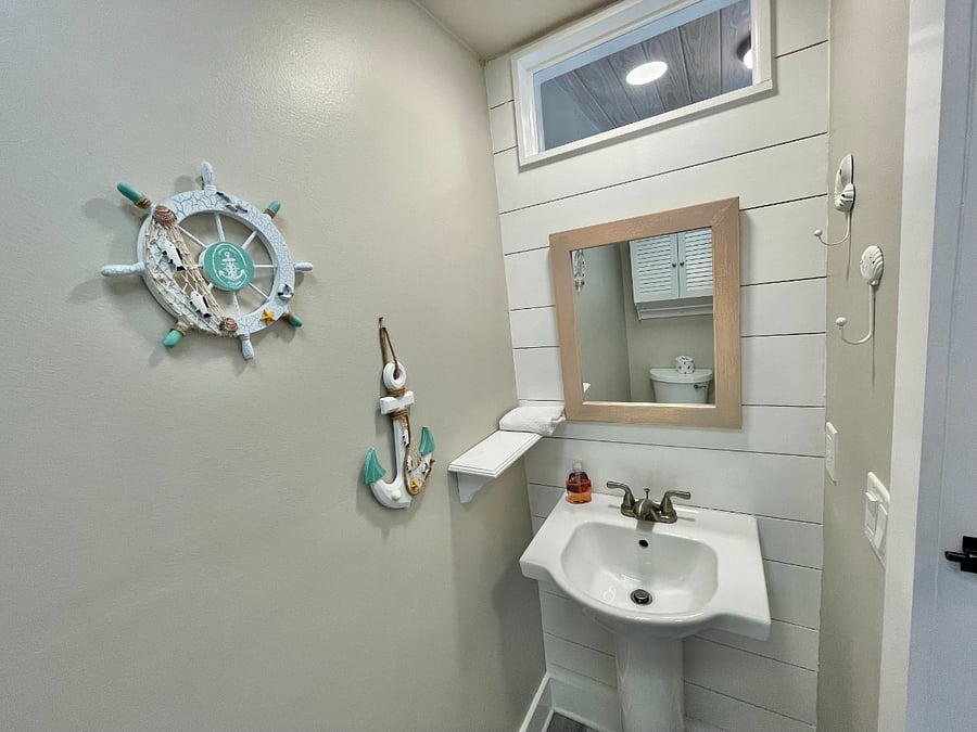 Half bath downstairs adjacent to kitchen