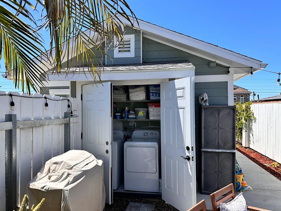 Laundry shed with washer and gas drier