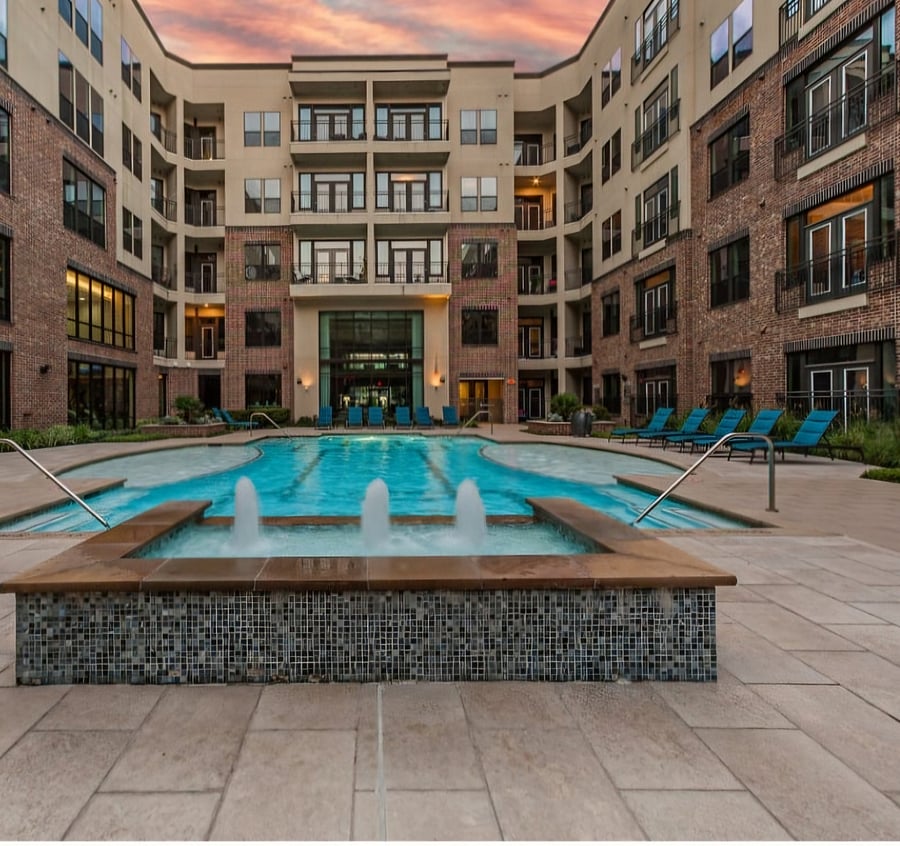 This unit has a living room pool view.