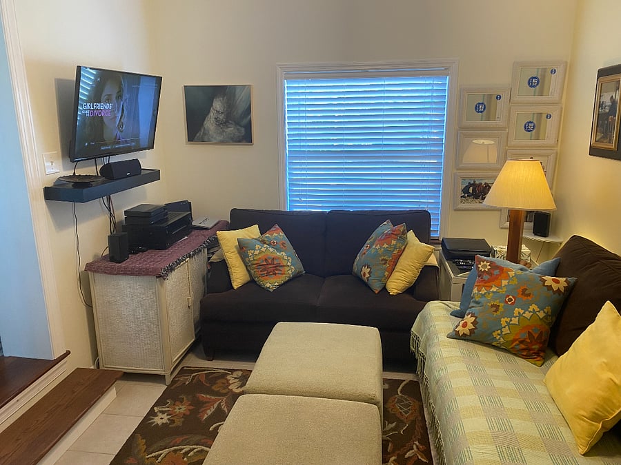 TV room, library is ONE STEP DOWN from main floor