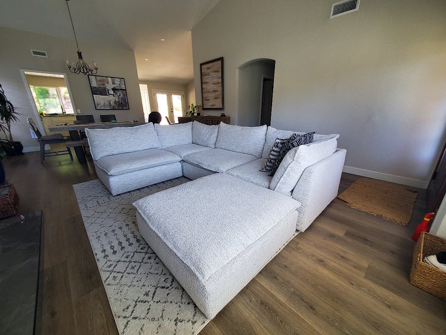 Spacious living room, open concept with large communinity table