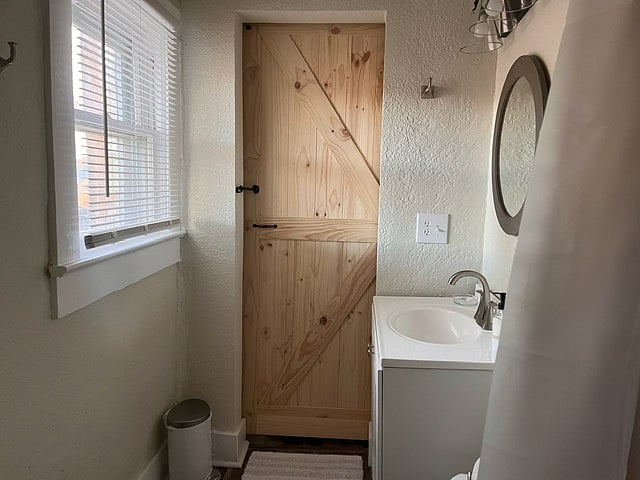 Barn door at bathroom.